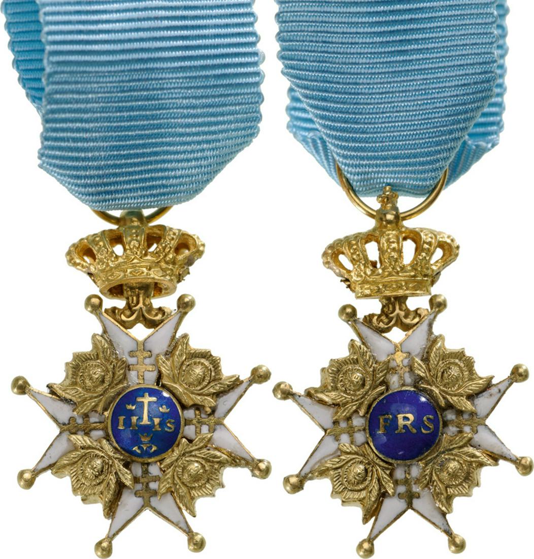 The Order of the Seraphim: Miniature of the Order in GOLD and enamels, 19x12 mm, of beautiful, complex manufacture, late 19th Century, hinged upper crown and suspension ring, original ribbon. A beautiful piece, pristine conditi