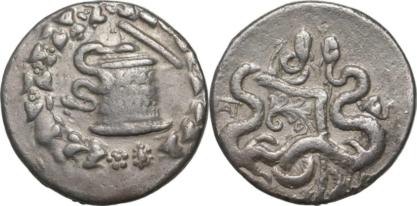 IONIA. Ephesos. Cistophor Silver (27 mm, 12.23 g): Cista mystica with serpent, all within ivy wreath/ Bow case between two serpents, bust of Artemis right. VF+