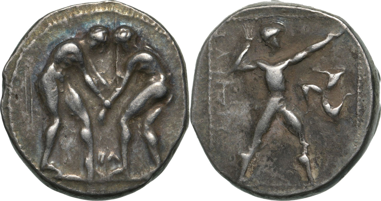 PAMPHYLIA, Aspendos. Circa 380-325 BC. Stater, Silver (21 mm, 10.94 g): Two wrestlers grappling, ML between / Slinger standing right, triskeles to right. Tekin Series D, SNG France -, SNG Copenhagen 233, SNG von Aulock 4559. XF, superb patina!