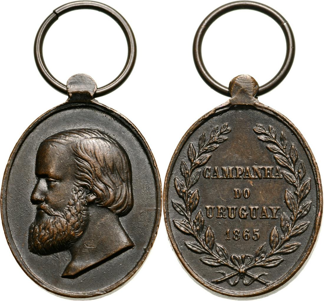 Uruguay Campaign Medal for the Troops, instituted in 1864: Breast Badge, patinated Bronze, obverse Pedro II to the left, the reverse legend "CAMPANH A DO URUGUAY 1865" surrounded by a laurel crown. Gill. p. 83 Ross Br14. Dim.: 22,0 x 19.5 mm. I