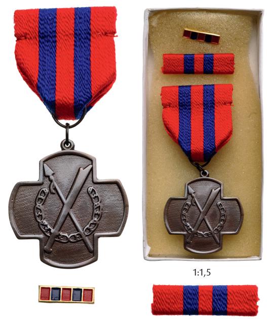 Anti-Dissidence Medal: Breast Badge, 40 mm, bronze, original suspension ring and ribbon with attachment pin, in original box of issue with ribbon bar and lapel hole rosette. Local manufacture. Mint state! I