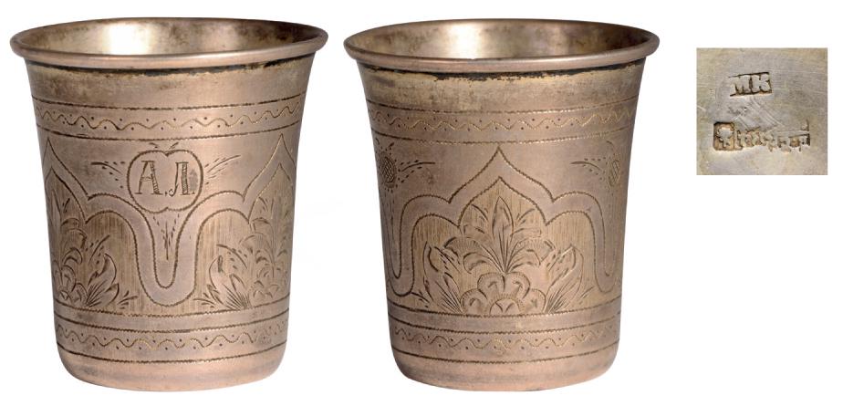 Silver vodka tumbler: Straight form, carving by arabesques and floral motives, 5.3 cm high, weight 39 g, "84" standard guarantee, Moscow 1890, essayer`s mark Vasili Semenov, silversmith Mika l Karpinski