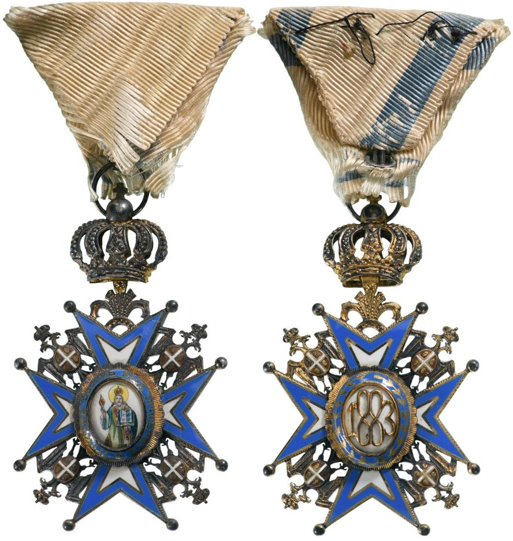 Order of St. Sava, 1883: 5th Class, 3rd Type. Breast Badge, 70x42 mm, Silver, enameled, central medallion gilt, enameled, with original suspension crown, ring and ribbon. Superb! I