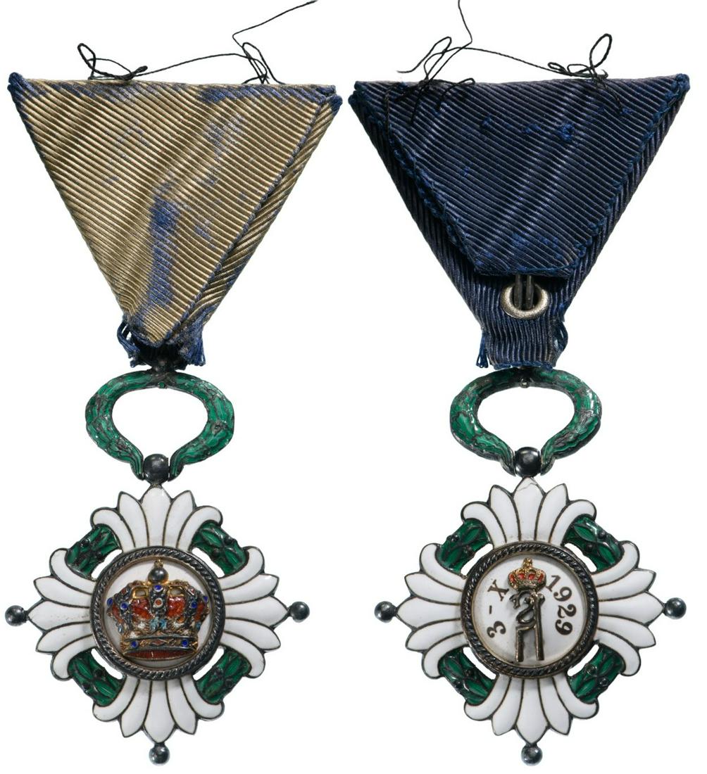 ROYAL ORDER OF THE YUGOSLAV CROWN: 5th Class. Breast Badge, 60x45 mm, Silver, enameled, central medallion gilt, enameled, with original suspension wreath, ring and faded ribbon. I