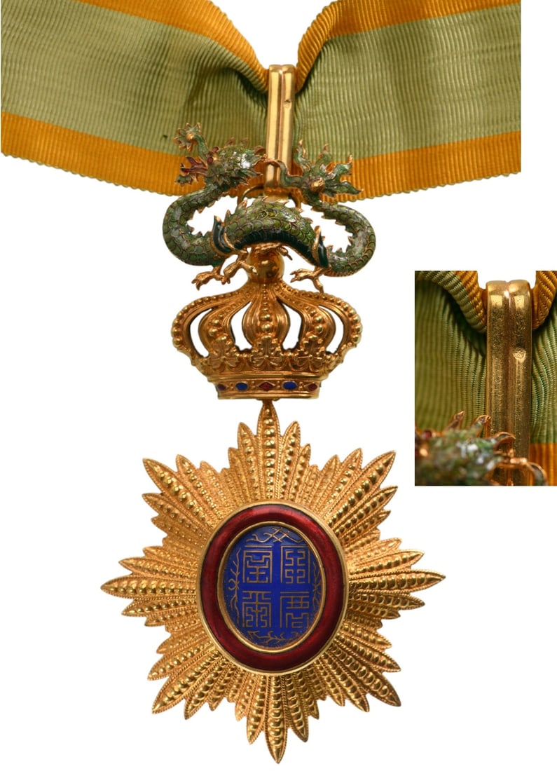 ORDER OF THE DRAGON OF ANNAM: Commander`s Cross, 3rd Class, instituted in 1886. Neck Badge, 127x73 mm., gilt Bronze, brilliant cut rays, central medallion enameled, original suspension device, ring and ribbon. A superb badge, in m