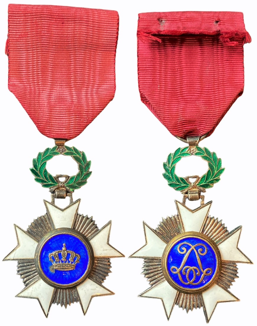 ORDER OF THE CROWN: Knight`s Cross, 5th Class, instituted in 1897. Breast Badge, 70x45 mm, gilt Silver, both sides enameled (damage), both central medallions gilt silver, enameled, original suspension wreath, loop and ri