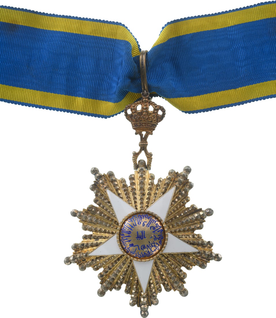 ORDER OF THE NILE: Commander's Cross, 3rd Class. Neck Badge, 91x64 mm., Silver, one side enameled, central medallion gilt, enameled, original gilt suspension crown, loop and ribbon. Extremely fine condition! I