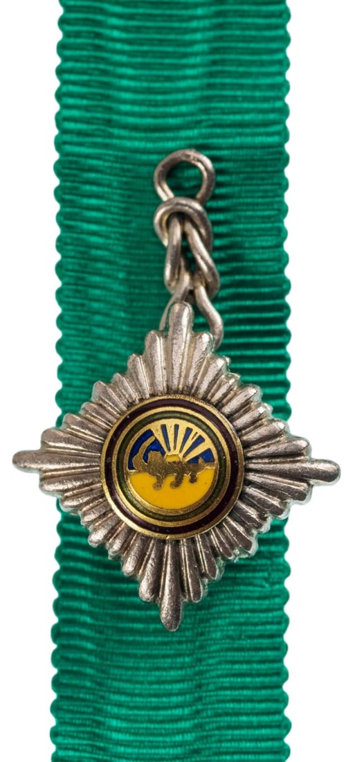 ORDER OF HOMAYOUN (SUN AND LION): Knight's Cross Miniature, instituted in 1939. Breast Badge, 17 mm, Silver, central medallion gilt, enameled, original suspension ring and ribbon. Mint state!