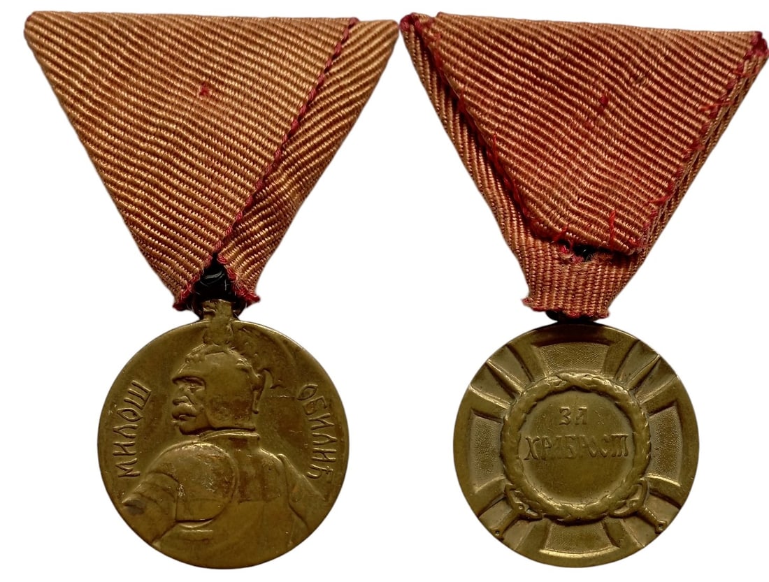 Milos Obilic Bravery Medal 1913, Gold Grade: Breast Badge, 35 mm, gilt Bronze , original suspension ring and ribbon. I-