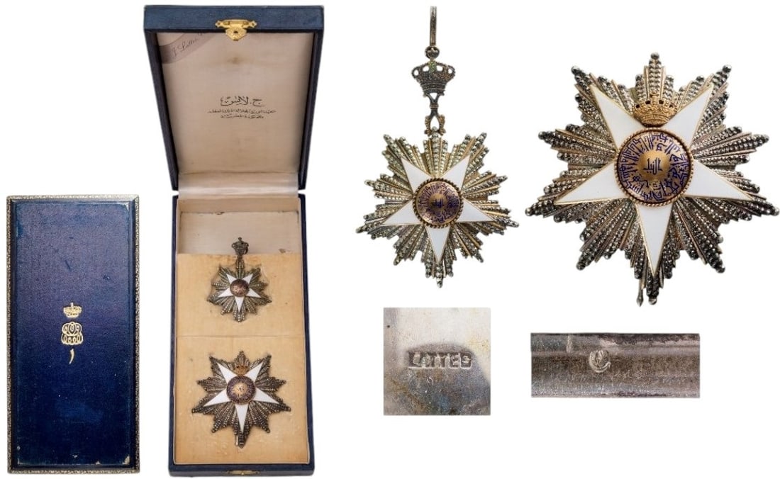 ORDER OF THE NILE: Grand Cross Set, 1st Class, 1st Type, instituted in 1915. Sash Badge, 93 mm, partially gilt Silver, enameled, superimposed part gilt enameled, maker`s mark "LATTES", with original suspension crown. Br