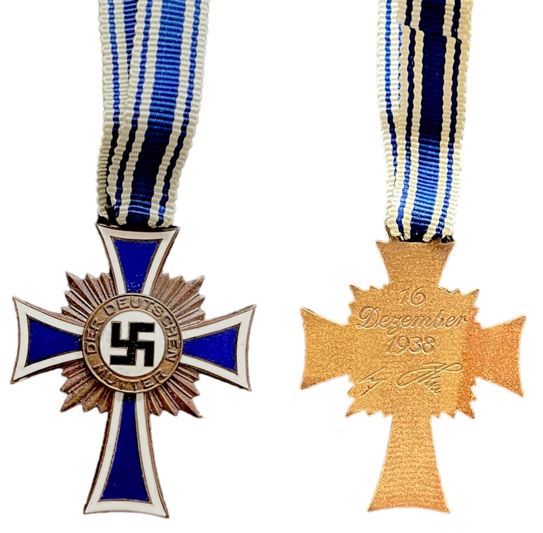 Cross of Honour of the German Mother "Ehrenkreuz der Deutschen Mutter", instituted in 1939: 3rd Class. Breast Badge, 47x37 mm, Bronze, original suspension ring and ribbon. I