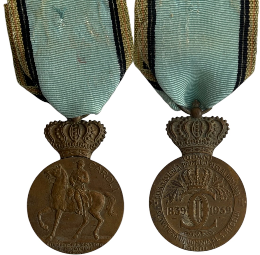 The Centennial Medal, instituted on 5th of May 1939: Breast Badge, 55x35 mm, Bronze, on obverse the King on horseback, on reverse the years "1839-1939", with original ring and ribbon, for the celebration of the 100th Anniversary of the birth of King Car
