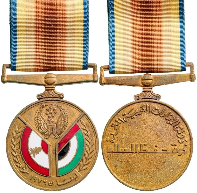 Peacekeeping Lebanon Medal, 1979: Breast Badge, 32 mm, Bronze, one-side enameled, original suspension ring and ribbon. Extremely fine and scarceI I R!