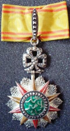 ORDER OF NICHAN EL IFTIKAR: Country: TUNISIA Commander's Cross. Neck Badge silver partially enamelled original suspension loop and ribbon.