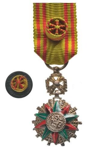 ORDER OF NICHAN IFTIKHAR: Country: TUNISIA Miniature Officer's Badge. Breast Badge silvered metal enameled diamond cut rays ornamented suspension device original ribbon with rosette. Comes with lapel hole rosette.