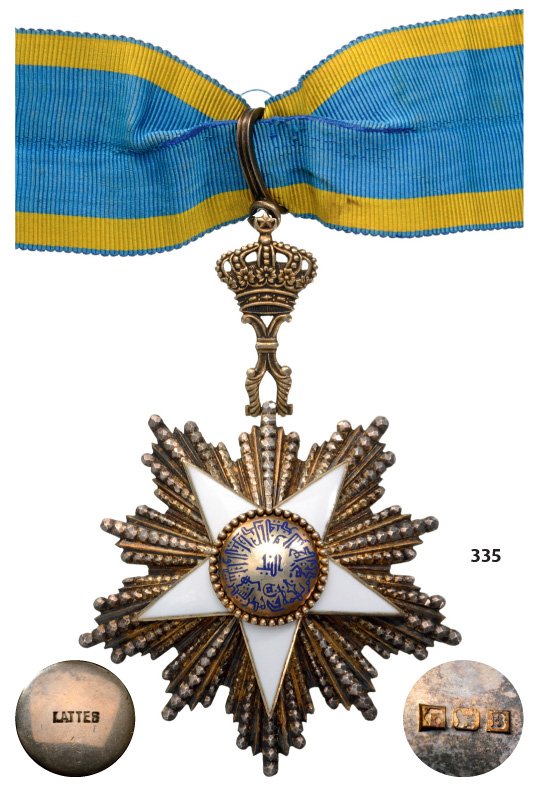ORDER OF THE NILE: Country: EGYPT Commander 's Cross, 3rd Class, instituted in 1915. Neck Badge, silver gilt with brilliant cut rays, 63 mm, superimposed parts silver gilt enameled, original suspension loop and long nec