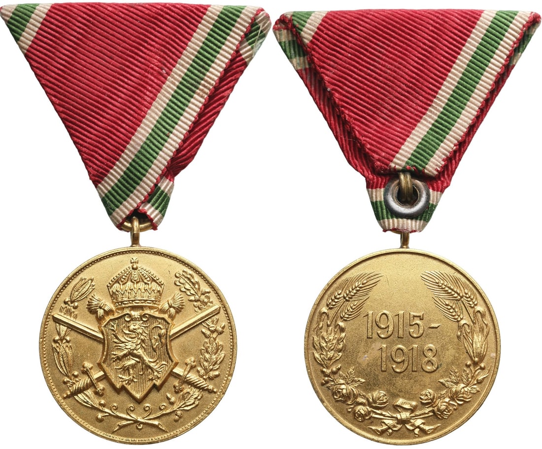 Commemorative Medal for Participation in the War, 1915-1918: Breast Badge, 37x32 mm., gilt Bronze, original suspension ring and ribbon. Mint condition! I