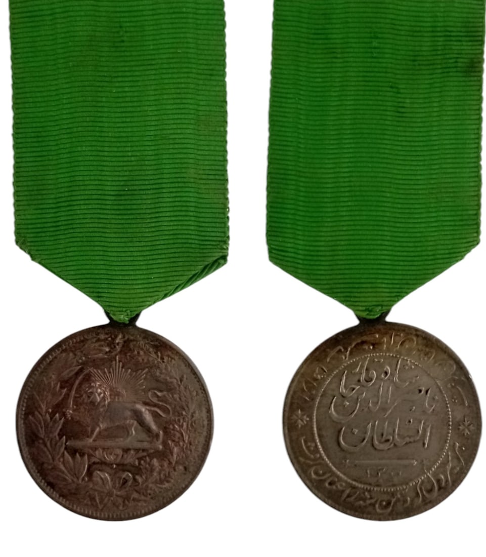 ORDER OF HOMAYOUN (SUN AND LION): Silver Medal. Breast Badge, 42x36 mm., Silver, original suspension ring and ribbon. Extremely fine and rare! I R!