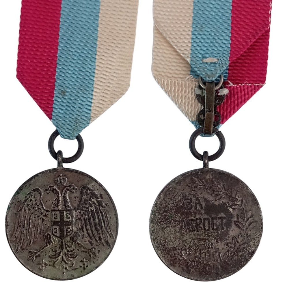 Bravery Medal, 1912: Breast Badge, 28 mm, silvered, original suspension ring and ribbon. I-