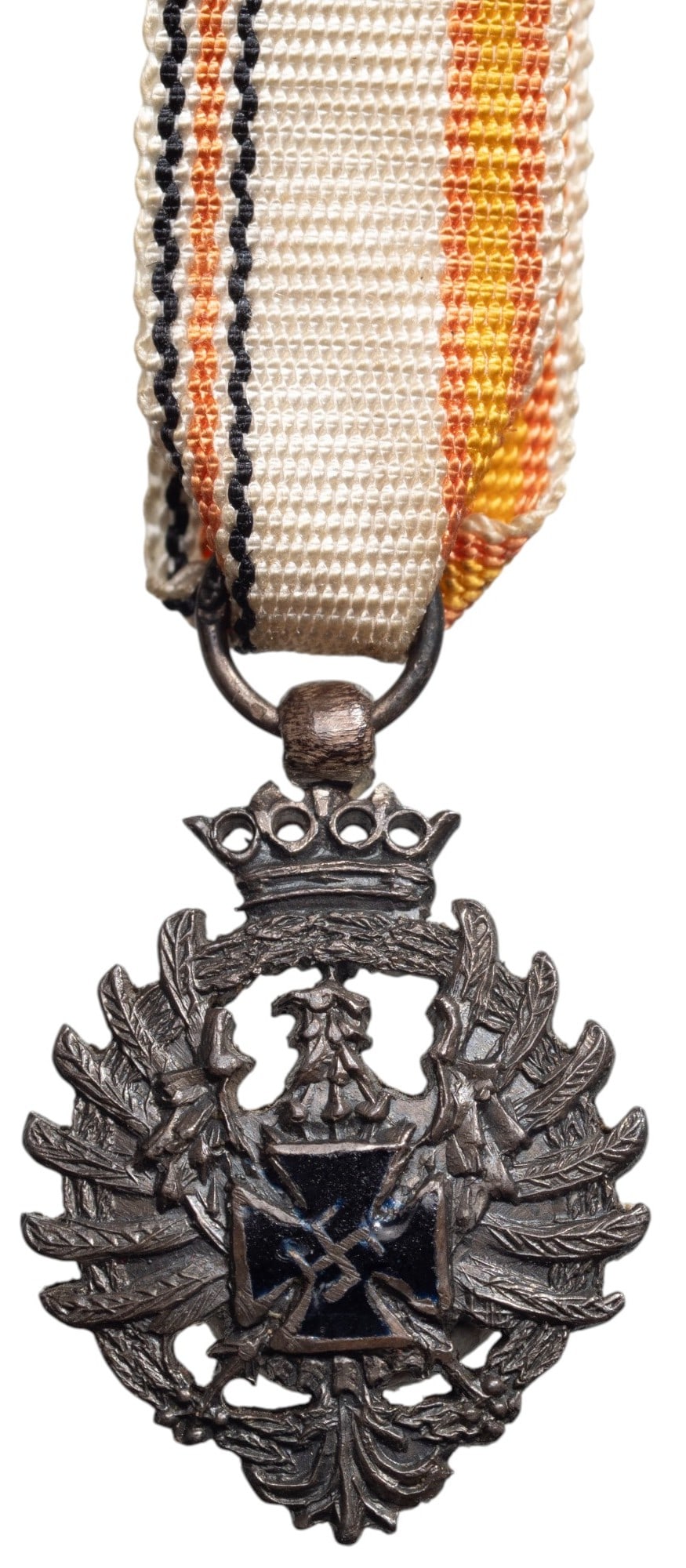 Military Decoration for the Members of the Spanish Blue Division in the Soviet Union, 1943: Miniature, instituted in 1943. Breast Badge, 20x15 mm, silvered Bronze, center enameled, original suspension ring and ribbon. A rare miniature, in extremely fine condition! I R!