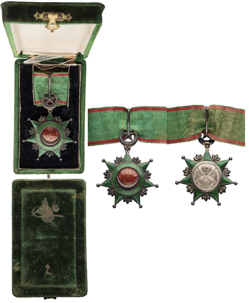 ORDER OF OSMANI: Commander's Cross, 3rd Class, instituted in 1862. Neck Badge, 81x64 mm, GOLD and Silver, both sides enameled, original suspension crescent, ring and ribbon, in original velvet case of issue, with gilt