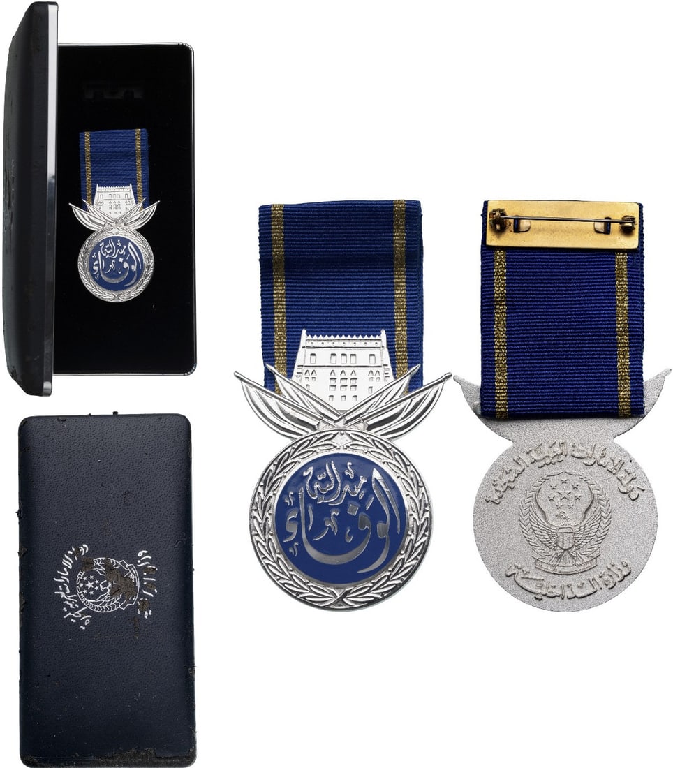 Medal of Loyalty, 2nd Class, by Fattorini: Breast Badge, 59x39 mm, silvered, one-side enameled, original suspension ring and ribbon, in case of issue with gilt weapon on the lid and cardboard protection box with gilt weapon on the lid, by "Fat
