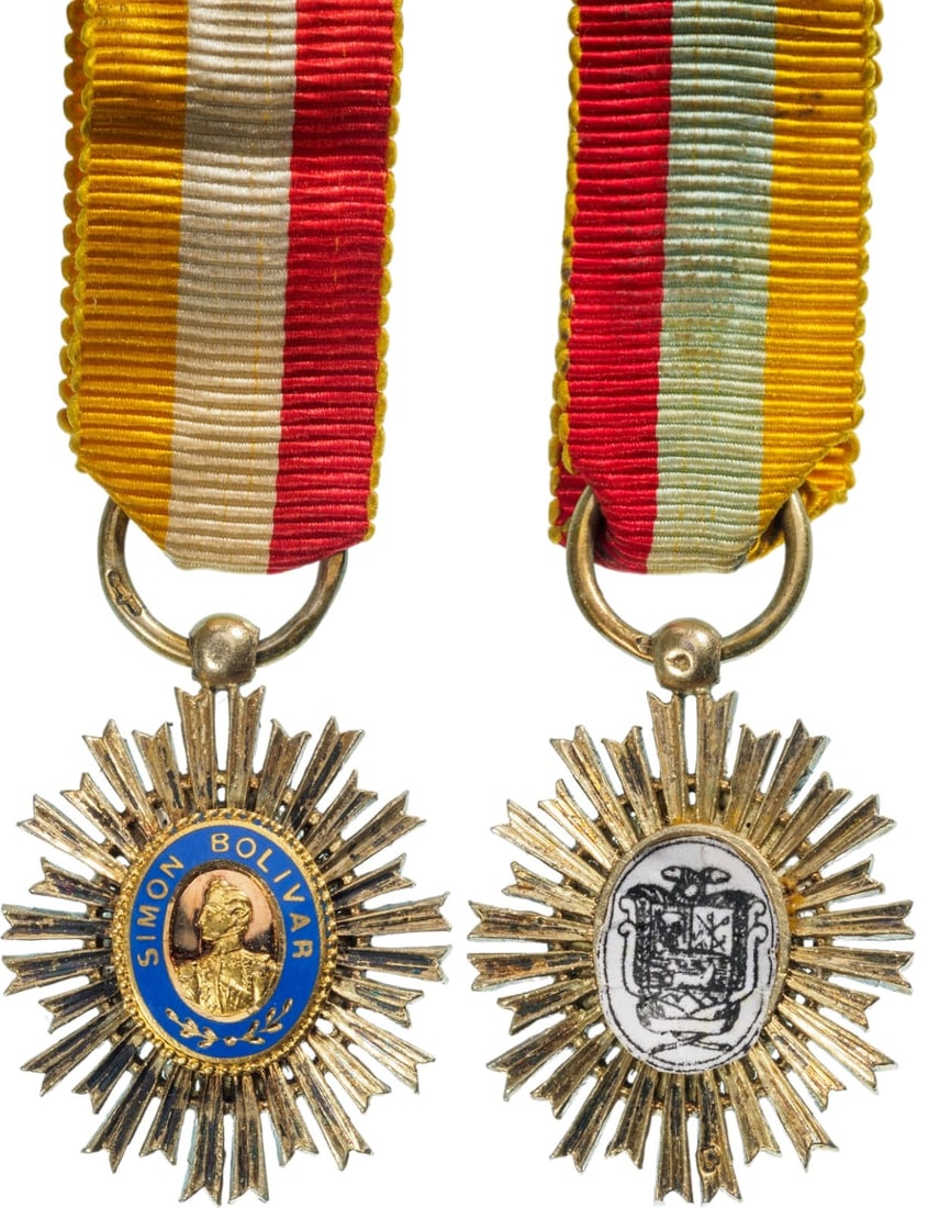 Order of the Libertador, instituted in 1880: Breast Badge Miniature, 25x19 mm, gilt Silver with smooth rays, central reverse medallions missing and replaced, original suspension ring and ribbon. IV