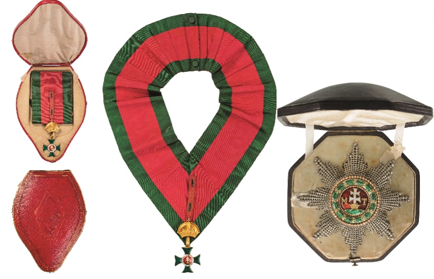 The Royal Hungarian High Chivalric Order of St. Stephen, the Apostolic King: A complete grand Cross set: Sash Badge in Gold, the arms with translucent, green enamel on both sides; red enameled centre medallion with white patriarch’s cross, sided by the golden initials “M&r