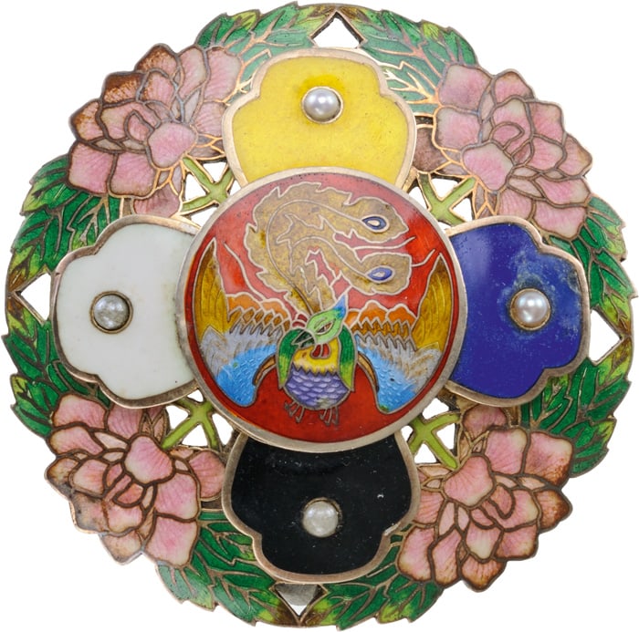 The Medal of the Phoenix: Gilt Silver, with 4 pink enameled roses sided by green leaves, with overlying “cross”, the arms enameled in yellow, blue, black and white resp. and centered by a pearl each; fire-red enameled