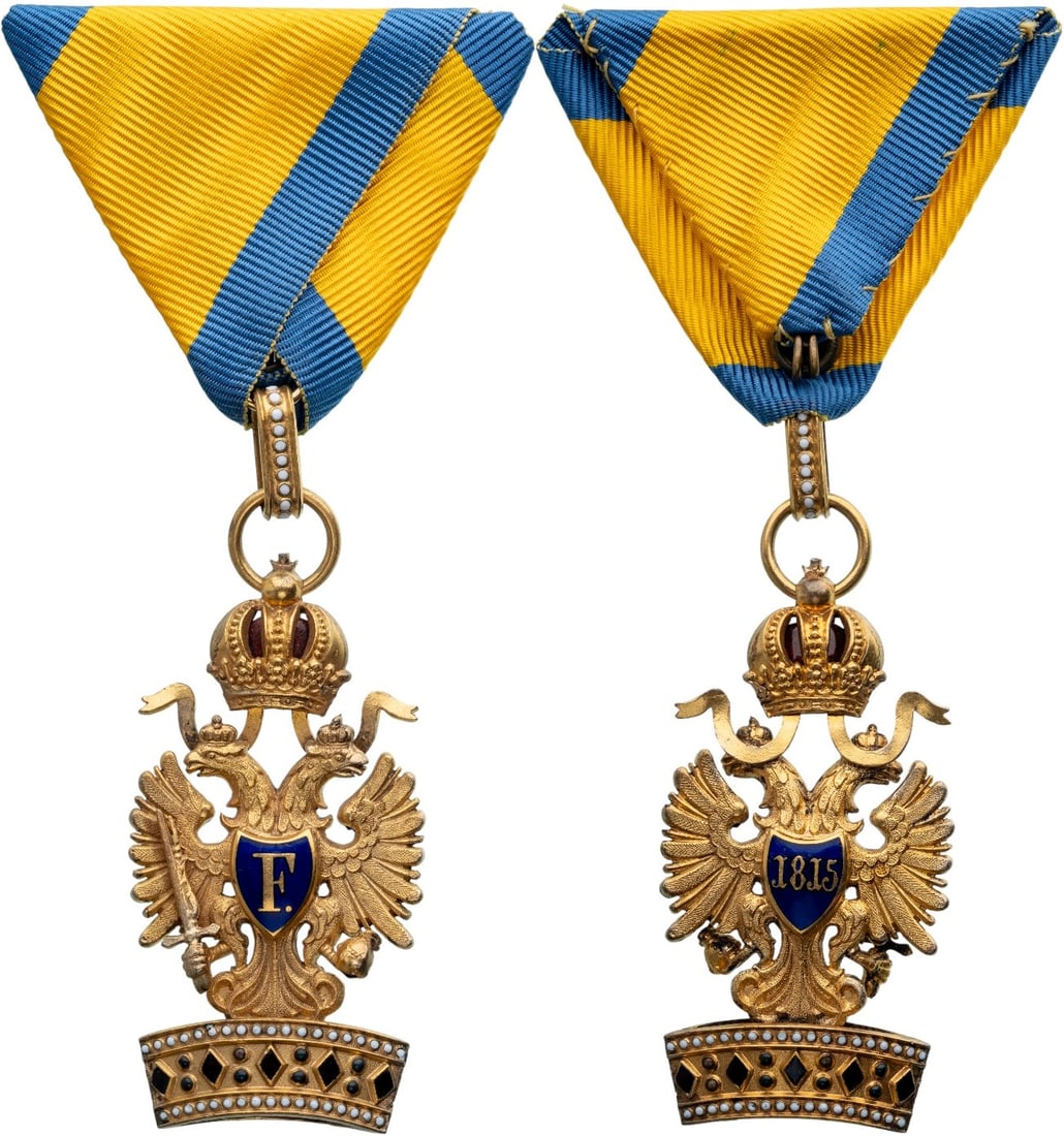 ORDER OF THE IRON CROWN: 3rd Class Badge, instituted in 1816. Breast Badge, gilt Bronze, enameled, 57x29 mm, original triangular ribbon. Superb badge in mint state! IA superb model, around 1900, in extremely fine condition. I