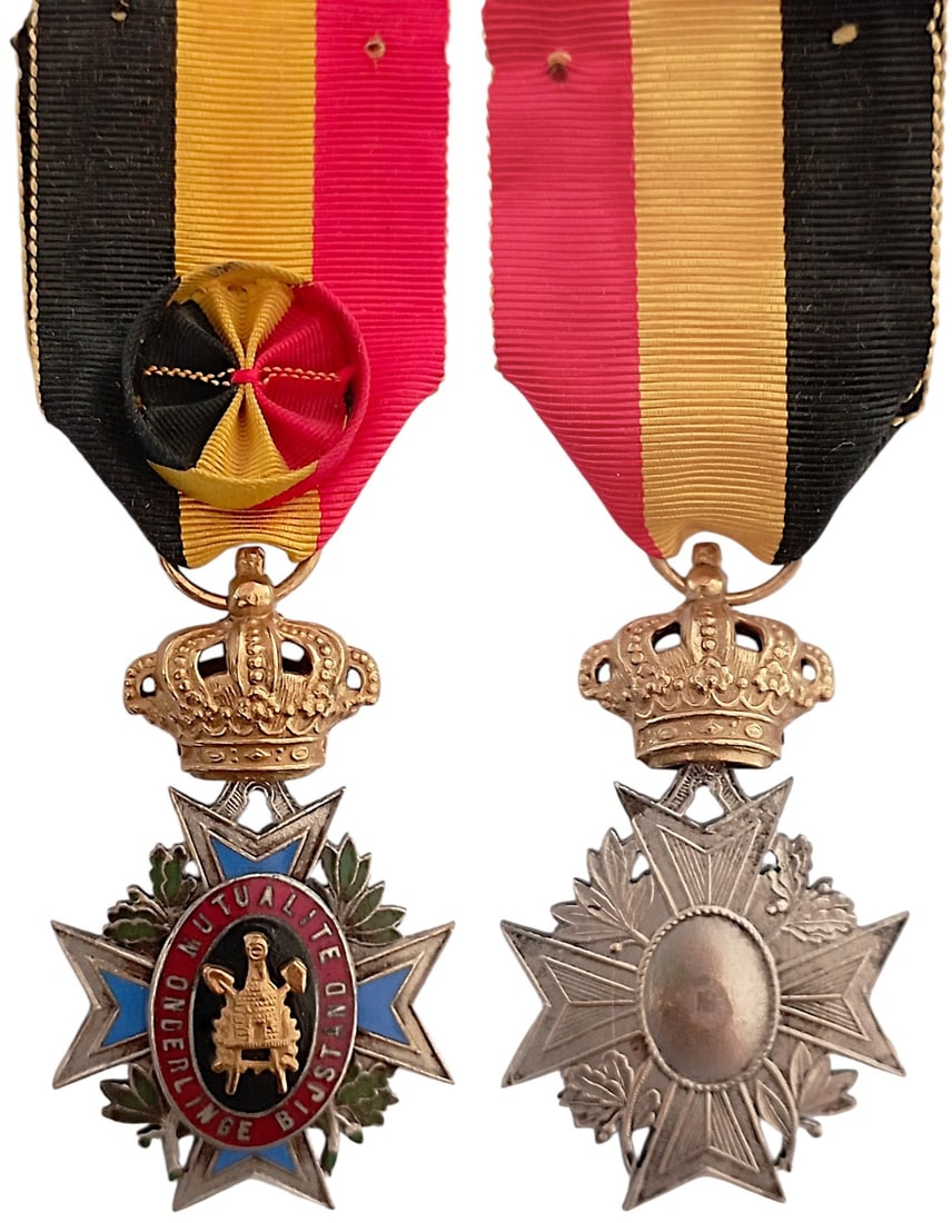 Gold Medal for Mutual Aid Societies: Breast Badge, 54x33 mm, partially gilt Silver, one side enameled, original suspension crown, ring and ribbon with rosette. A beautiful cross in extremely fine condition! I