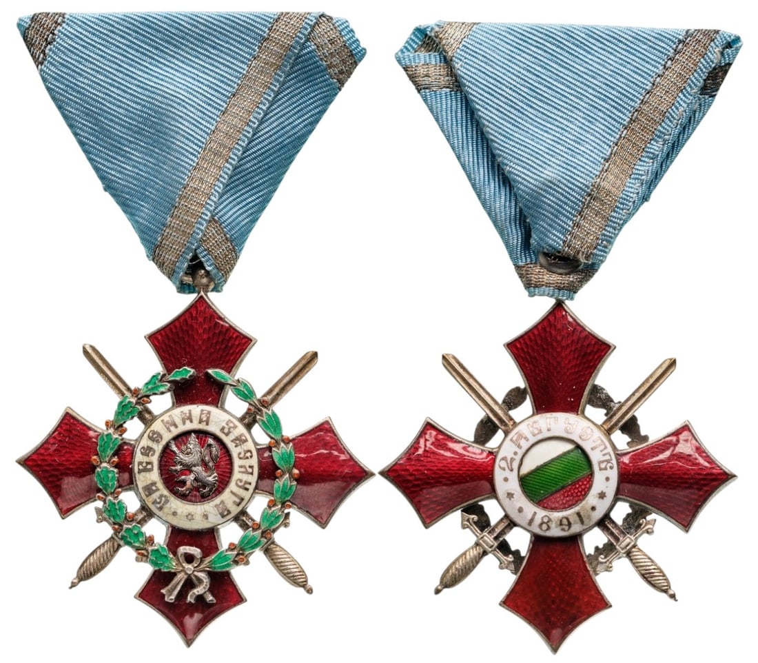 Order of Military Merit: Knight's Cross with Battlefield Distinction, 5th Class, Republic Model, 1944-1950. Breast Badge, 54x51 mm., Silver, both sides enameled, original suspension ring and triangular ribbon. Extremely fine 