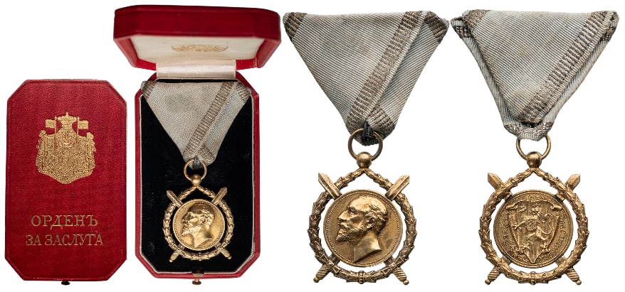 Order of Merit: Breast Badge, 40x33 mm, gilt Silver, original suspension ring and triangular ribbon, in original Leather Case of Issue by "Rothe, Wien", with gilt weapon and inscription on the lid. A highly elegant o