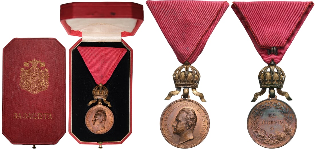 Medal for Merit: 3rd Class 4th Type, 1st Model of Crown, King Ferdinand. Breast Badge, 52x28 mm, Bronze, original suspension ring and triangular ribbon, in case of issue by "Rothe, Wien", with gilt weapon and inscript