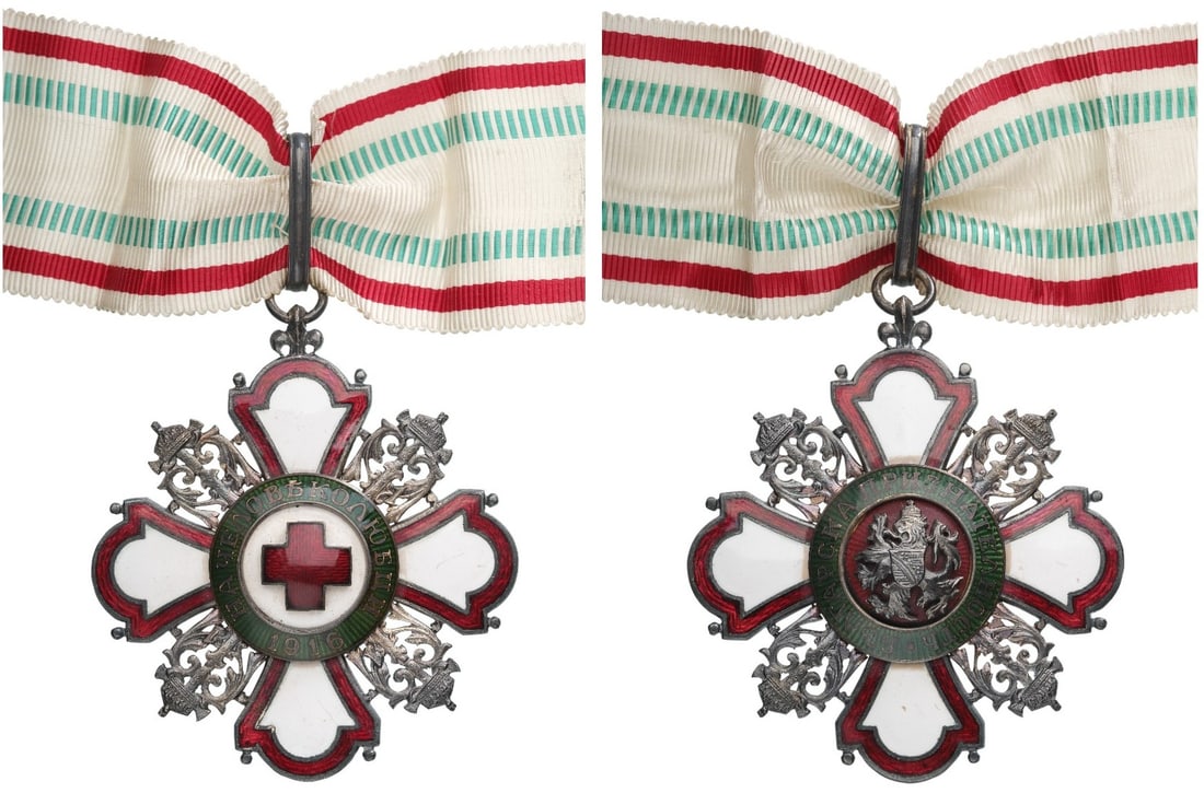 Order for Insensitive to Humanity, 2nd Class: Commander Cross for Men. Neck Badge, 67x54 mm., Silver, both sides enameled, original suspension ring, loop and ribbon. Extremely fine condition and rare! I R!