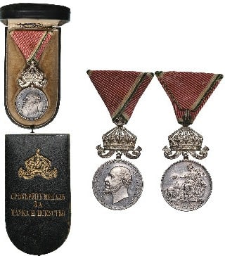Science and Culture Medal, Silver Class, Tsar Ferdinand I Model, instituted in 1883: Breast Badge, 65x36 mm., Silver, original suspension ring and ribbon, in case of issue with gilt crown and inscription on the lid. A very rare medal in mint condition! I RR!