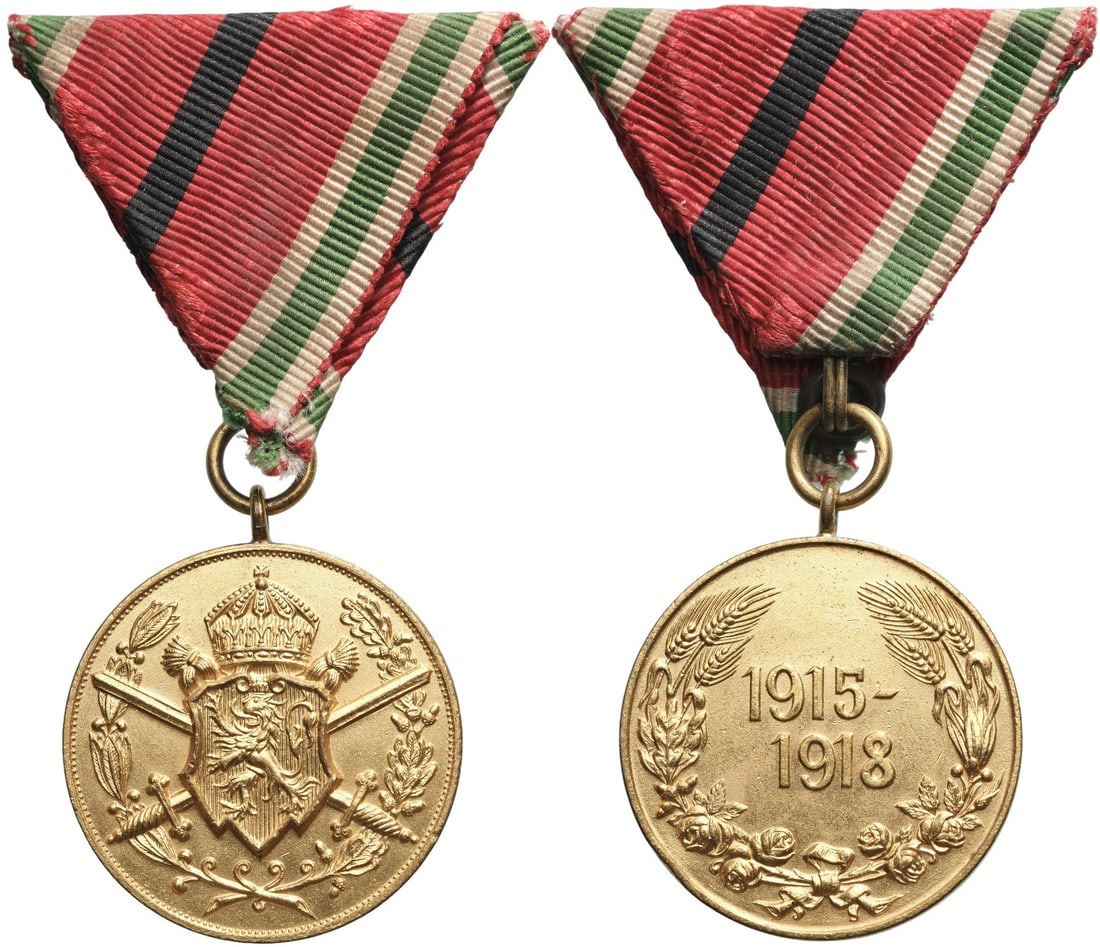 Commemorative Medal for Participation in the War, 1915-1918, for soldiers killed in action.: Breast Badge, 37x32 mm., gilt Bronze, original suspension ring and triangular ribbon. Mint condition and rare! I R!