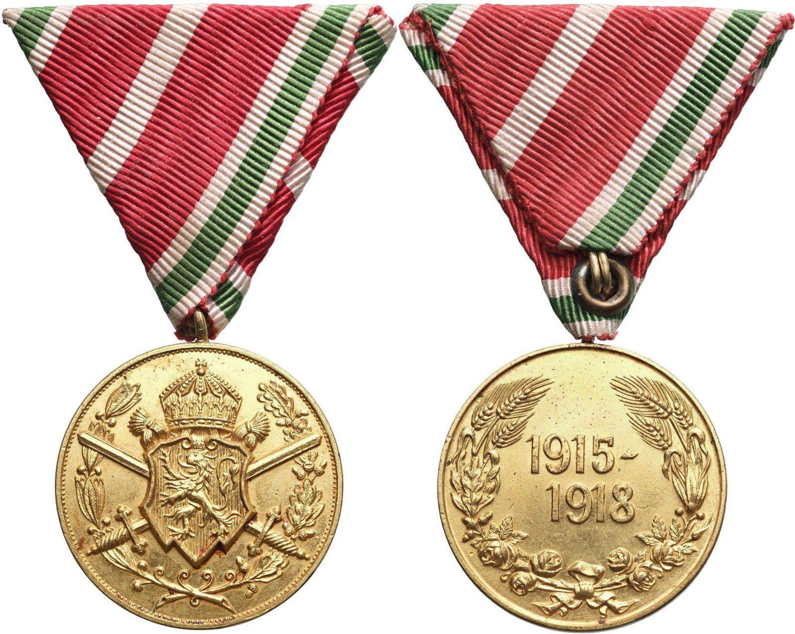 Commemorative Medal for Participation in the War, 1915-1918, for non-combatants: Breast Badge, 37x32 mm., gilt Bronze, original suspension ring and triangular ribbon. Mint condition!