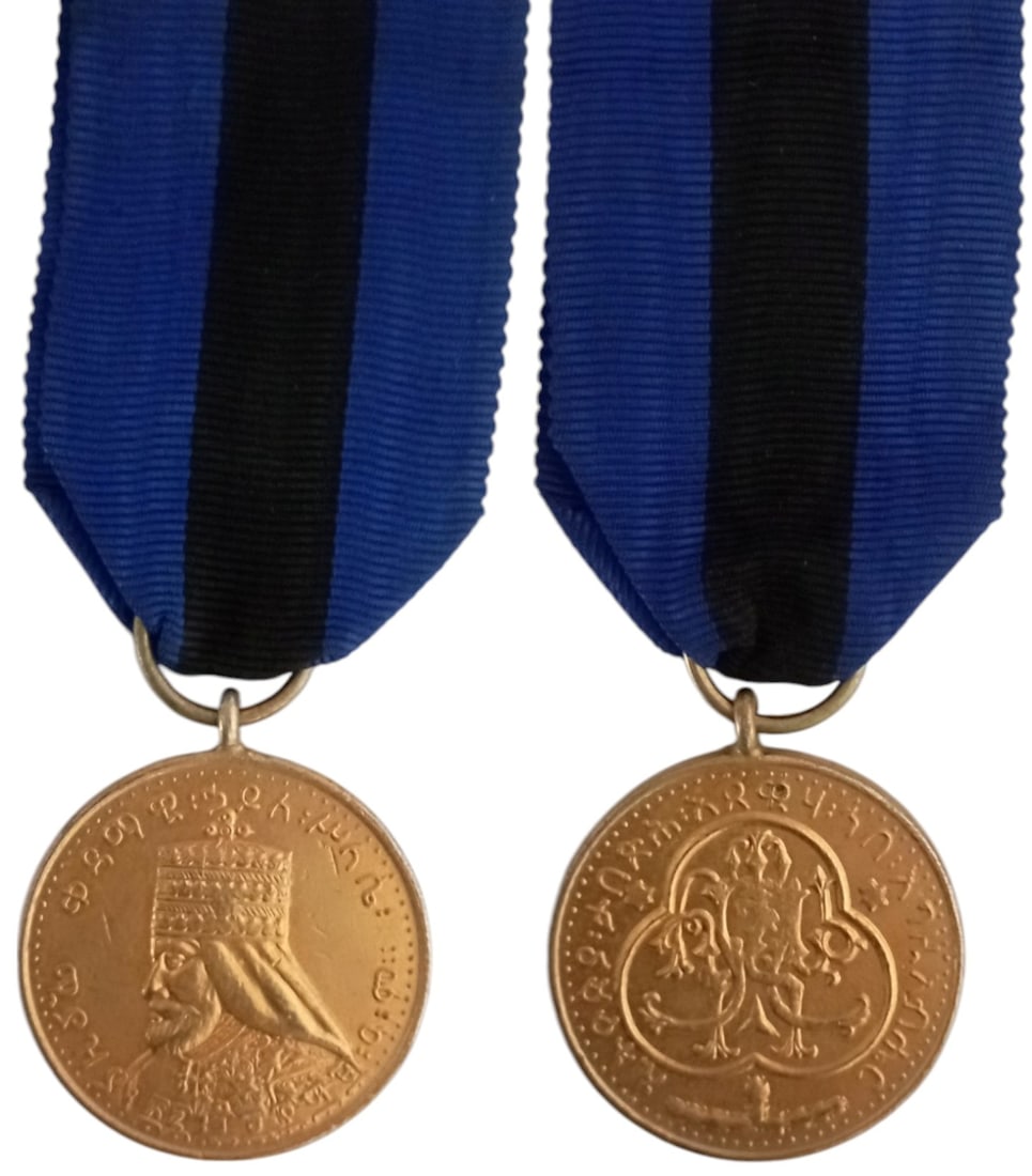 Emperor Haile Selassie I, Jubelee Medal, 1st Class, 1966: Breast Badge, 77x36 mm, gilt Bronze, original suspension ring and ribbon. Extremely fine and attractive! I