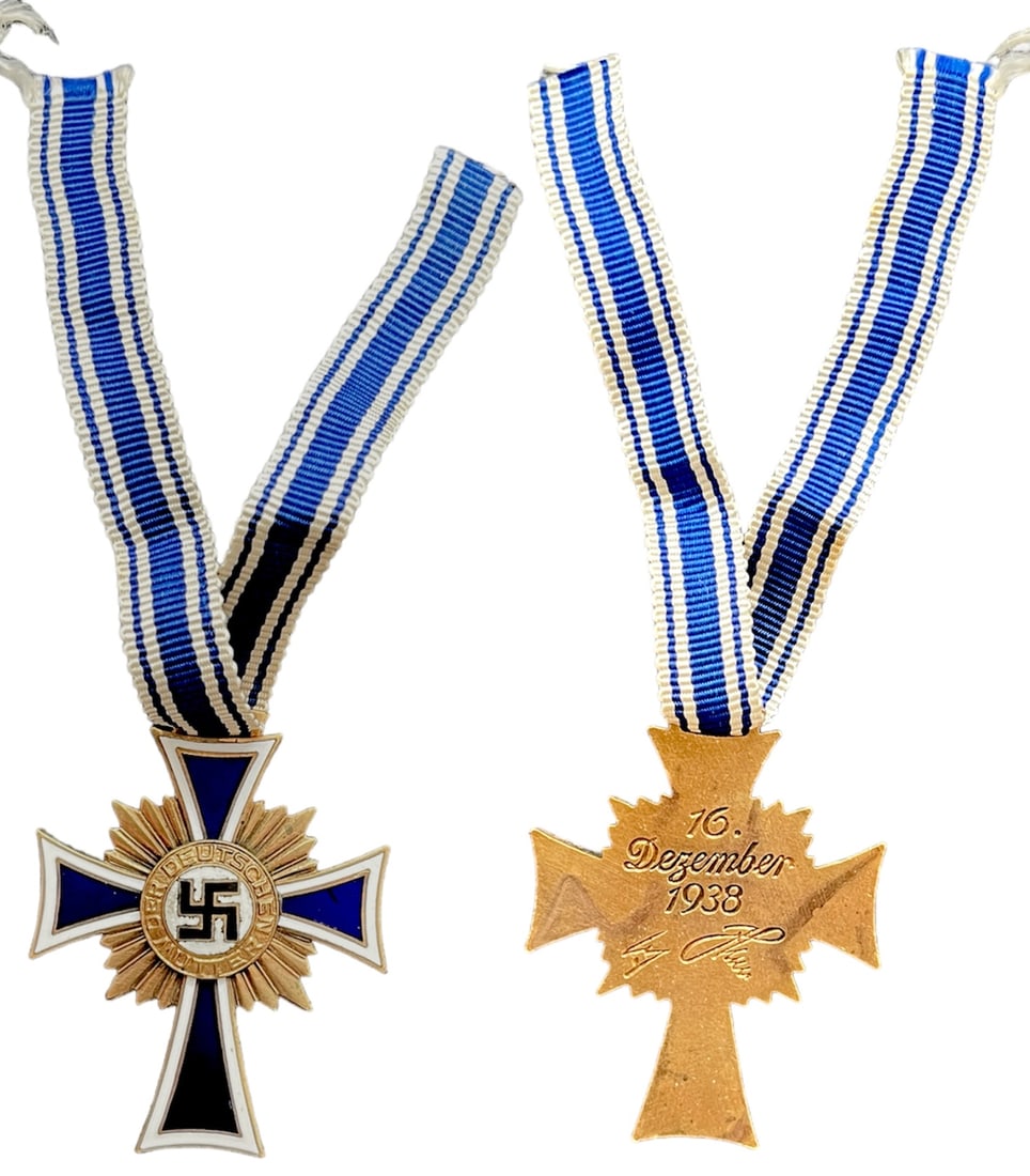 Cross of Honour of the German Mother "Ehrenkreuz der Deutschen Mutter", instituted in 1939: 1st Class. Breast Badge, 47x37 mm, gilt Bronze, original suspension ring and ribbon. I