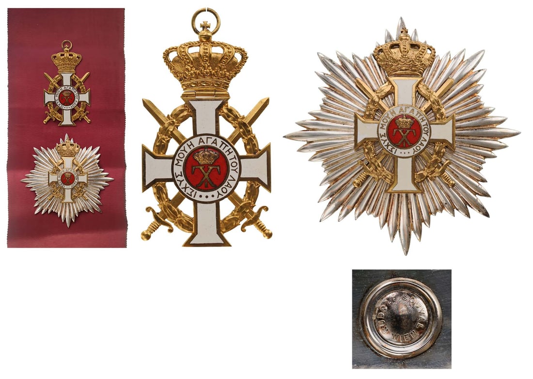 ORDER OF GEORGE I: A complete Grand Cross set with Swords. Sash Badge, 83x48 mm, in gilt Silver, white and red enamels, large, crossed swords passing through the laurel wreath, plain, smooth reverse, hinged upper crown 
