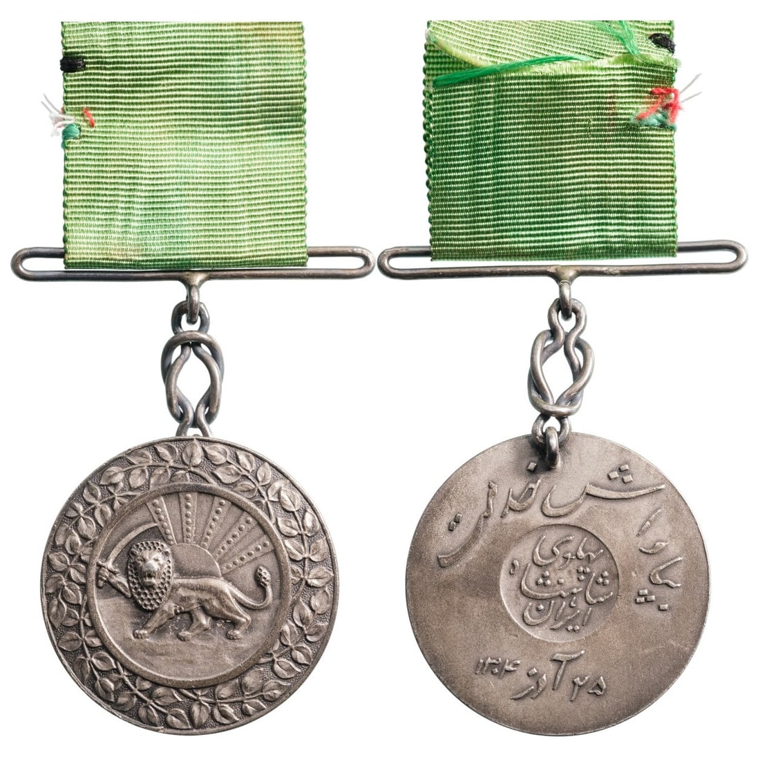 ORDER OF HOMAYOUN (SUN AND LION): Silver Medal. Breast Badge, 33 mm., Silver, original suspension chain and ribbon. Extremely fine and rare! I R!