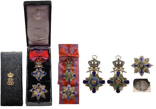 ORDER OF THE STAR OF ROMANIA, 1864: Grand Cross Set, 1st Model (1877), for Military in Time of Peace. Sash Badge, 115x76 mm, Silver gilt, both sides enameled, original suspension ring and long complete sash. Breast Star with Swords, 92 