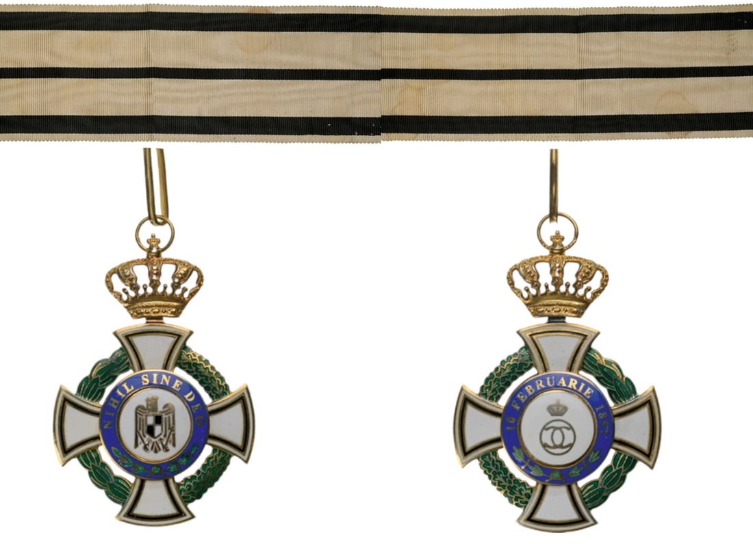 ORDER OF THE ROYAL HOUSE (1935): Commander`s Cross, for Civil (1937), 1st Model. Neck Badge, 76x53 mm., gilt Silver, maker`s mark "BW (Bruder Weiss, Bucarest)", hallmark, both sides enameled, blue enameled legend on obverse "Nihil Si