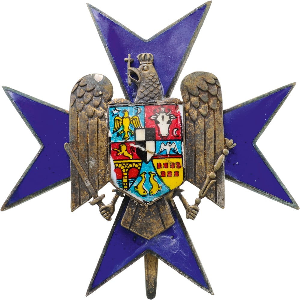 Order of the Civil Guard (1934): 2nd Class. Breast Star, 54 mm in silvered Bronze, one side blue enameled cross with enameled weapon in the centre. Large pin on the back, dark patina. The order was awarded for bravery and devotion in