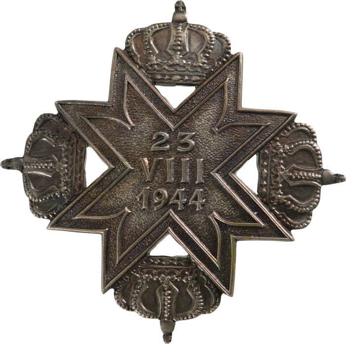 ORDER OF 23 AUGUST 1944: 2nd Class, instituted in 1944. Breast Badge, 40 mm, Silver, horizontal bar on reverse. The order was given for non-commissioned officers and men that have taken part in the royal coup in Romania on Au