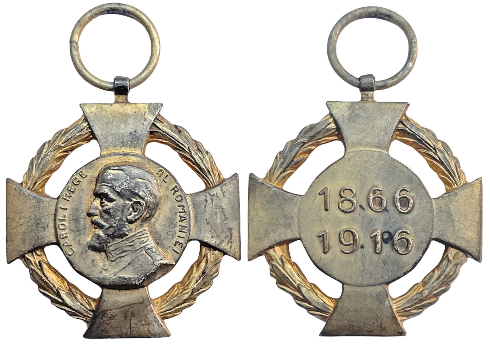 Cross for 50 Years of Reign of Carol I, PATTERN: Breast Badge, 35 mm, gilt Bronze, original suspension ring. An extremely rare cross, issued for the 50th Anniversary of Reign of King Carol I, but never awarded due to his death in 1914. RR! I