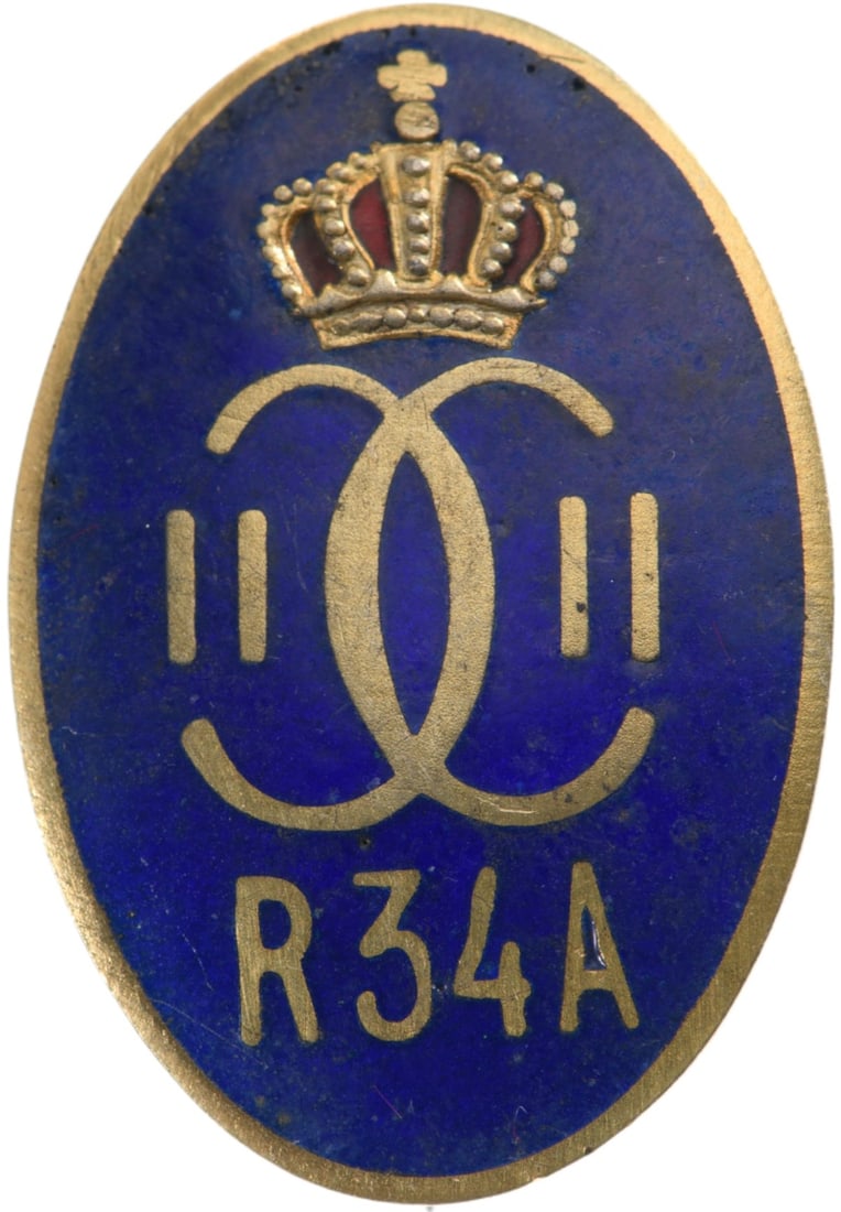 Special Collection of 7 Year Regimental Badges of the 34th Artillery Regiment: Breast Badge, 27x17 mm, gilt Silver, one side enameled, with thin pin. M.S.B.R 185. Rare! I