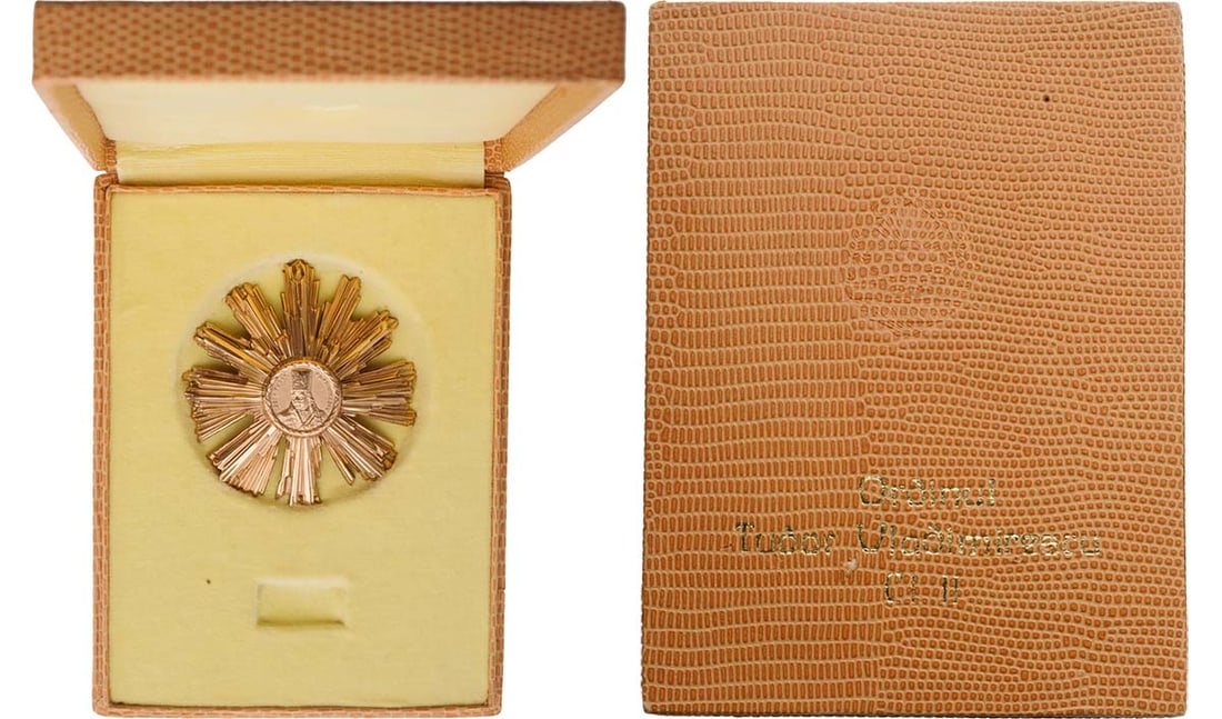 RSR - ORDER OF "TUDOR VLADIMIRESCU", instituted in 1966, in GOLD: 2nd Class (1966). Breast Star, 66 mm, GOLD, 48.1 g, center enameled, 10 groups of rays, reverse with horizontal pin, in the centre bust of Tudor Vladimirescu within a wreath of oak leaves, in case of 