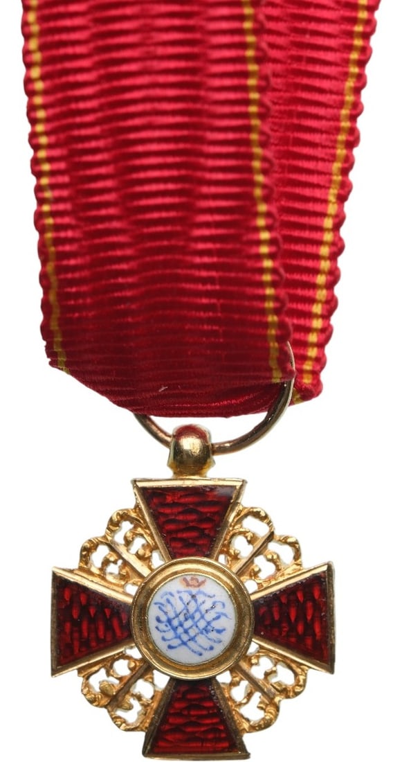 ORDER OF SAINT ANNA: Knight 's Cross Miniature, instituted in 1735. Breast Badge, 13x12 mm., GOLD, enameled, obverse center missing, original suspension ring, loop and ribbon. IV